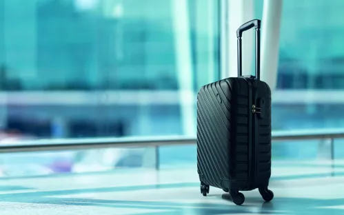 TREMONT Kemény gurulós bőrönd