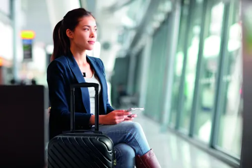 TREMONT Kemény gurulós bőrönd